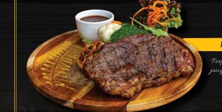 Bonappé grilled Angus striploin photographed for its restaurant menu
